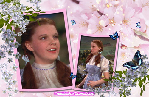 Judy Garland as Dorothy in pigtails and wearing her blue and white gingham dress