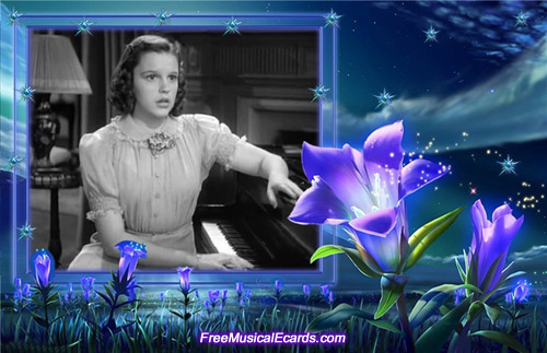 Judy Garland playing the piano and singing in Love Finds Andy Hardy