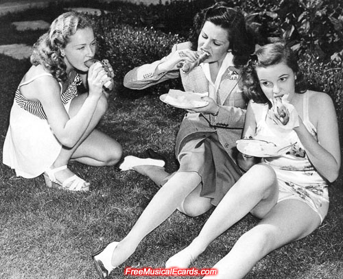 Judy Garland eating a hot dog