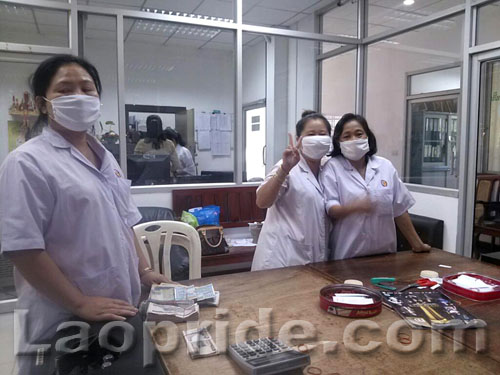 Money handler employees in Laos
