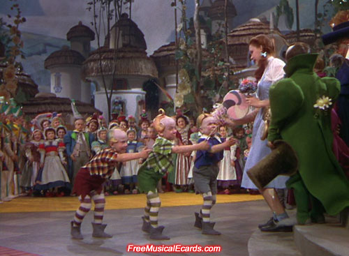 Judy Garland and the Munchkins in The Wizard of Oz