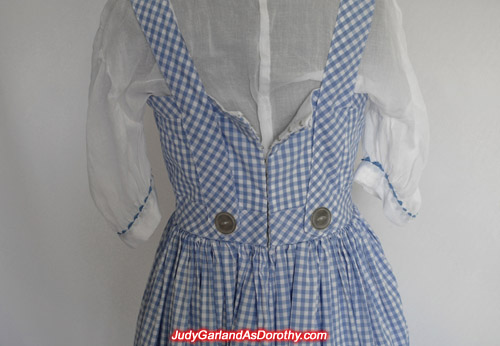 Back of Judy Garland as Dorothy's gingham pinafore dress