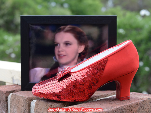 Beautiful sewing the sequins on Judy Garland's ruby slippers