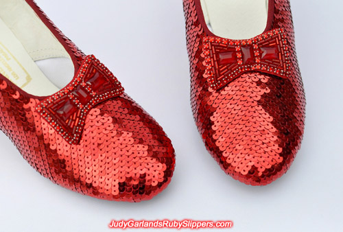 Closeup of the bow and toe on Judy Garland's ruby slippers