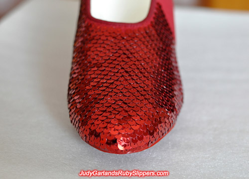 Closeup of the sequins on Judy Garland's ruby slippers