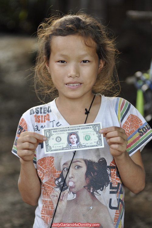 Donating Judy Garland's money to the children of Laos