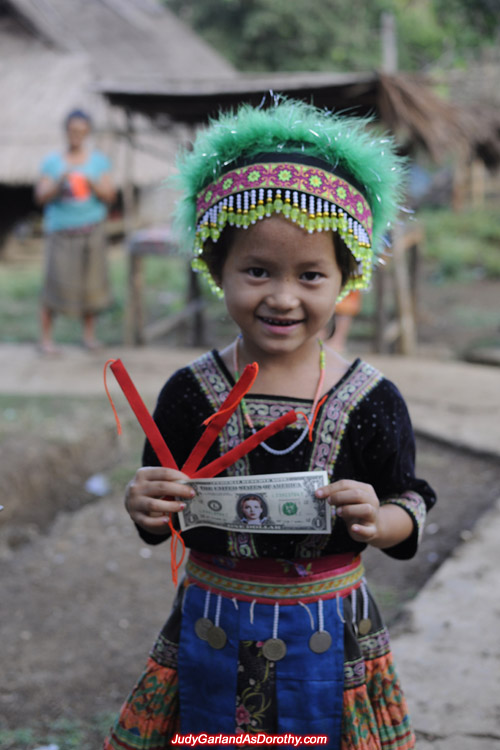 Donating Judy Garland's money to the children of Laos