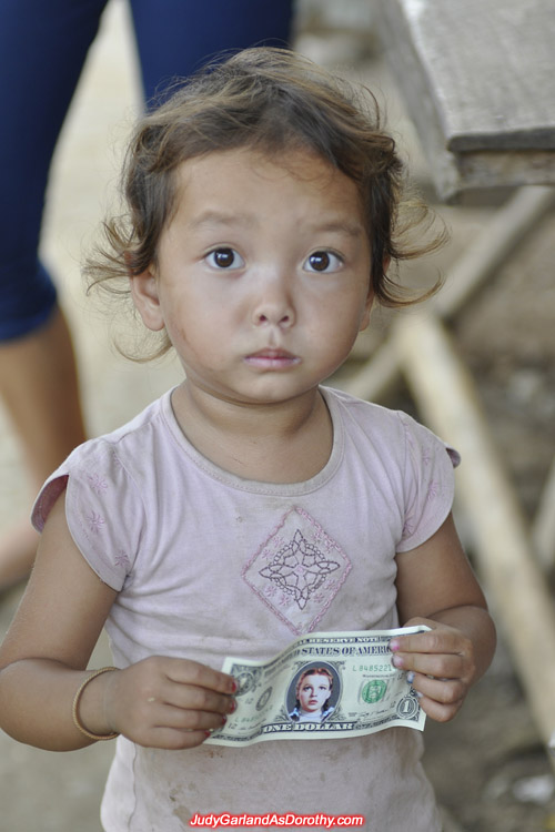 Donating Judy Garland's money to the children of Laos