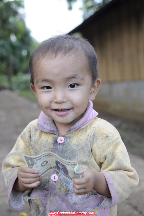 Donating Judy Garland's money to the children of Laos