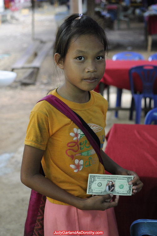 Donating Judy Garland's money to the children of Laos