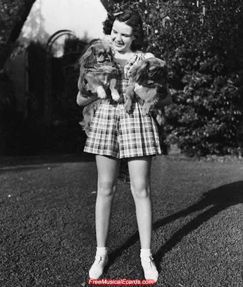 Judy Garland with her Pekingese dogs