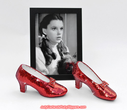 Stunning beauty Judy Garland as Dorothy and her ruby slippers