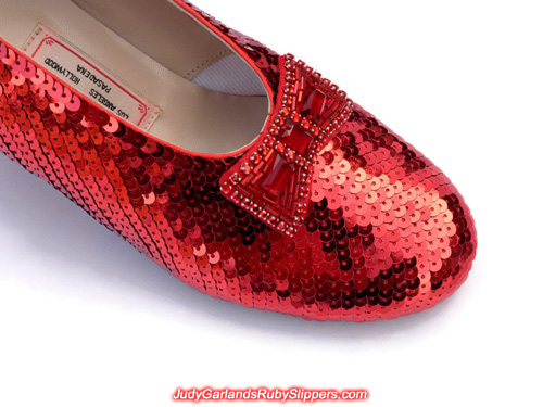 The right shoe of Judy Garland's ruby slippers is fully covered with sequins