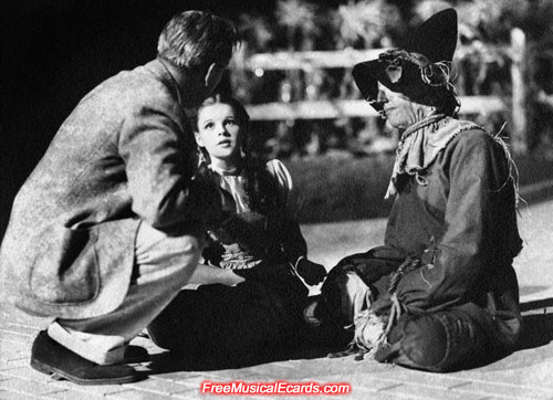 Young and innocent looking Judy Garland as Dorothy with Ray Bolger as the Scarecrow