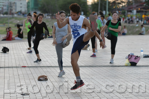 Aerobics on Mekong riverside in Vientiane, Laos