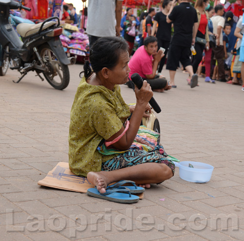 Begging on the streets of Vientiane, Laos