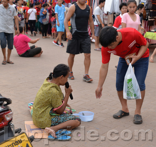 Begging on the streets of Vientiane, Laos