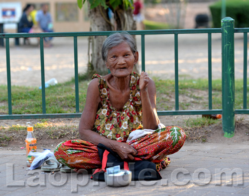 Begging on the streets of Vientiane, Laos