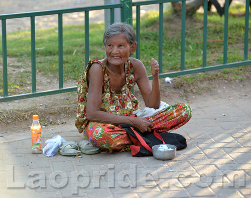 Begging on the streets of Vientiane, Laos