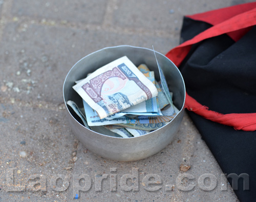 Begging on the streets of Vientiane, Laos