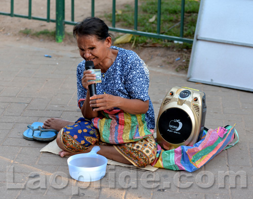 Begging on the streets of Vientiane, Laos