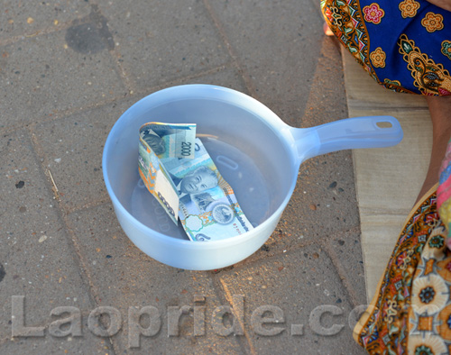 Begging on the streets of Vientiane, Laos