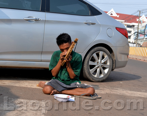 Begging on the streets of Vientiane, Laos