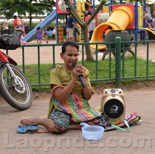 Begging on the streets of Vientiane, Laos