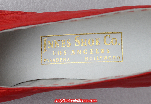 Heat stamped Innes Shoe Co. golden embossed label