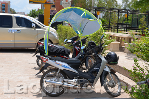 Motorbike sunshade and umbrella in Vientiane, Laos