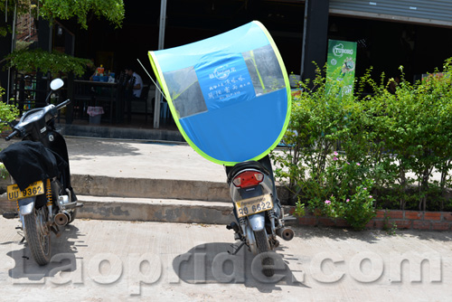 Motorbike sunshade and umbrella in Vientiane, Laos