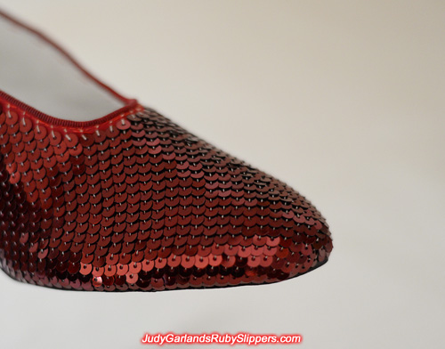 Sequining is in progress on the limited edition ruby slippers