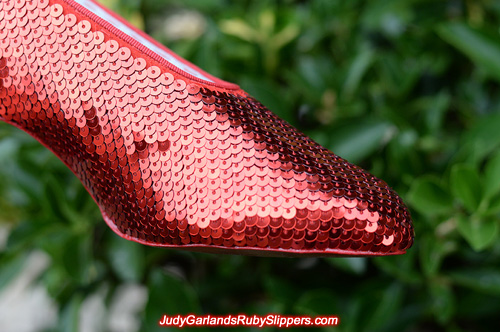 Sequining the left shoe of Judy Garland's ruby slippers
