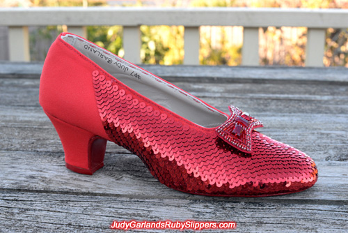 Sequining the right shoe of Judy Garland's ruby slippers