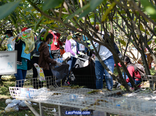 Students in Vientiane picking up litter in the park