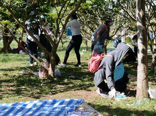 Students in Vientiane picking up litter in the park