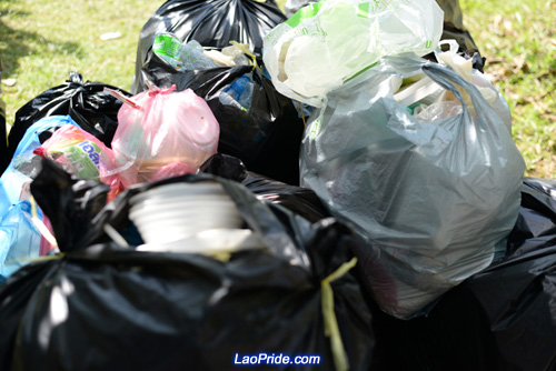 Students in Vientiane picking up litter in the park