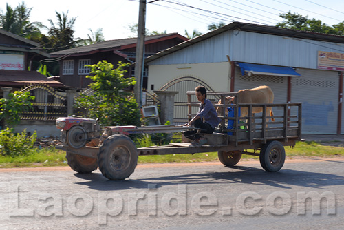 Tractors traveling on the outskirts of Vientiane, Laos