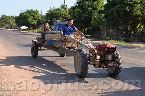 Tractors traveling on the outskirts of Vientiane, Laos