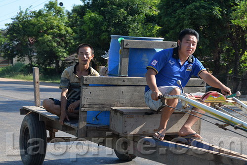 Tractors traveling on the outskirts of Vientiane, Laos