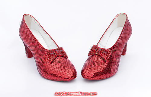 Exquisite pair of hand-sewn ruby slippers in Judy Garland's size