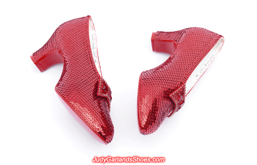 Exquisite pair of hand-sewn ruby slippers in Judy Garland's size