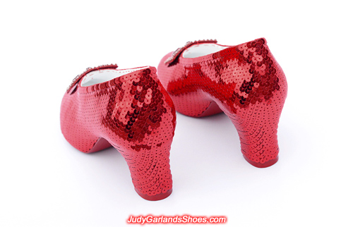Exquisite pair of hand-sewn ruby slippers in Judy Garland's size