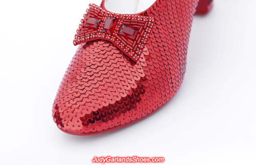 Exquisite pair of hand-sewn ruby slippers in Judy Garland's size