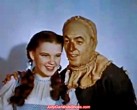Judy Garland as Dorothy with the Scarecrow