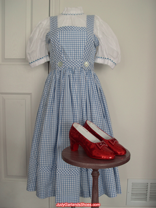 Judy Garland as Dorothy's dress and ruby slippers