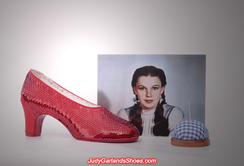 Judy Garland as Dorothy's right shoe is being sequined