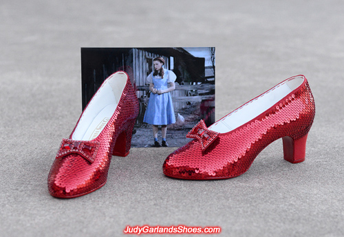 Sequining is in progress with Judy Garland's ruby slippers