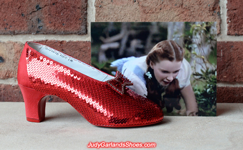 Sequining the right shoe of Judy Garland's ruby slippers