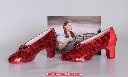 Sewing the sequins continues on Judy Garland's ruby slippers